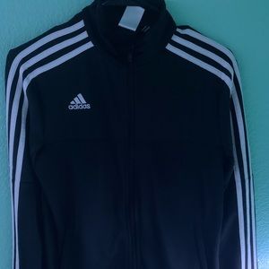 It is a black and white adidas jacket.